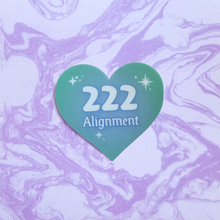 Load image into Gallery viewer, Teal gradient heart-shaped sticker with '222 Alignment' white text on a marbled purple and white background.
