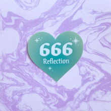 Load image into Gallery viewer, Teal gradient heart-shaped sticker with '666 Reflection' white text on a marbled purple and white background
